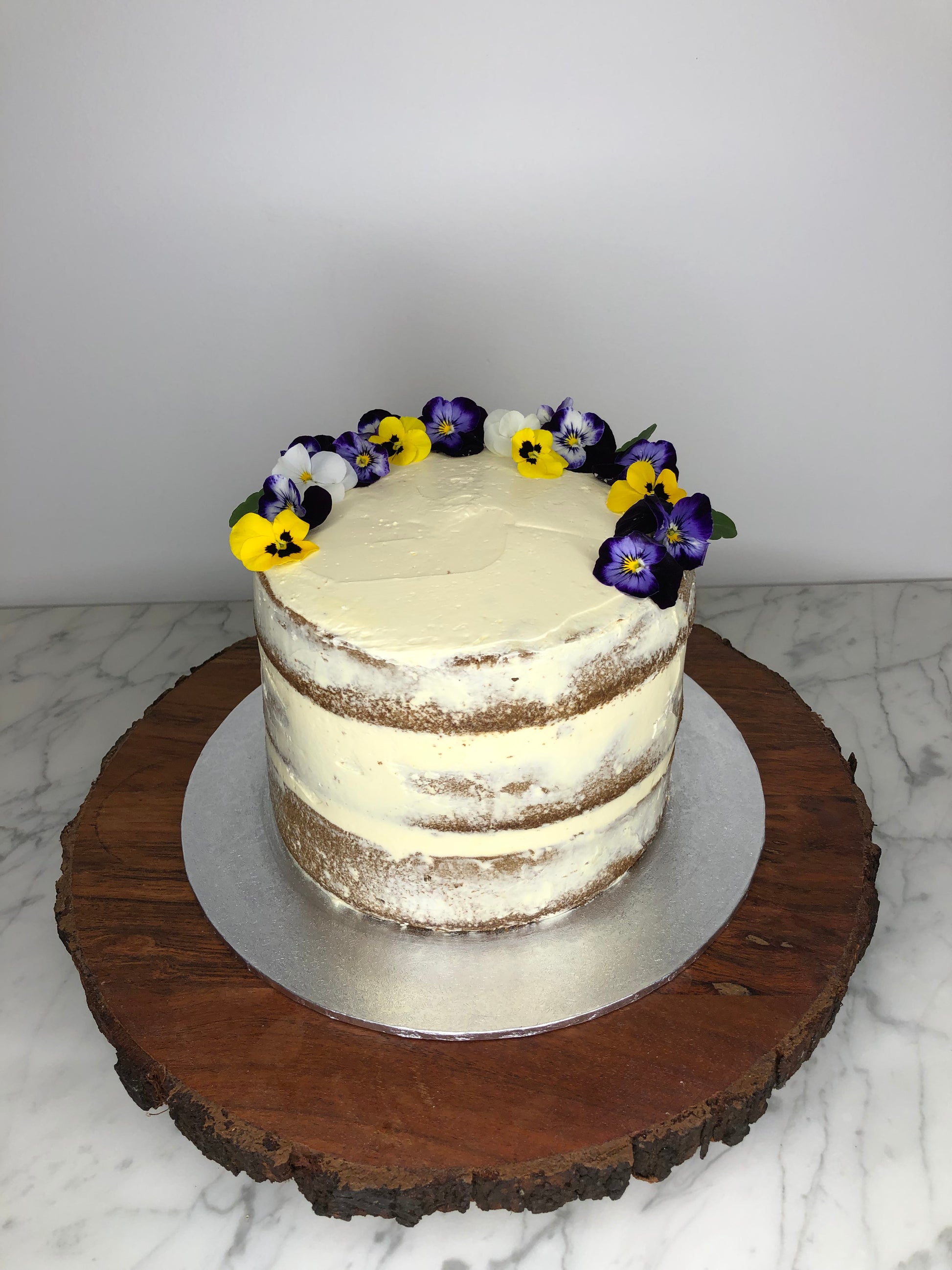 Naked cake with edible flowers